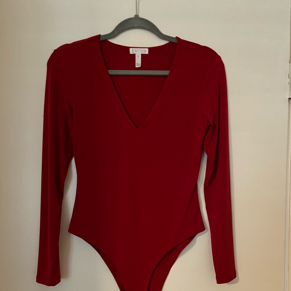 Leigh Bodysuit. Red. Long sleeve. Snap bottom-thong.